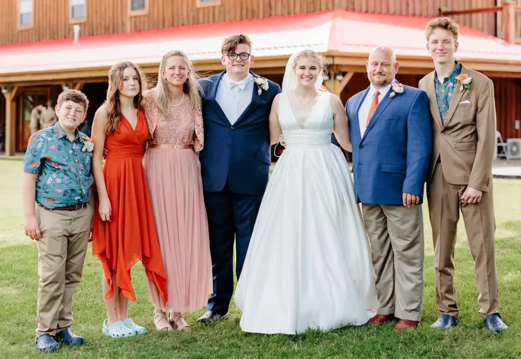 Dr Micah Carter and his family after a wedding for his kid
