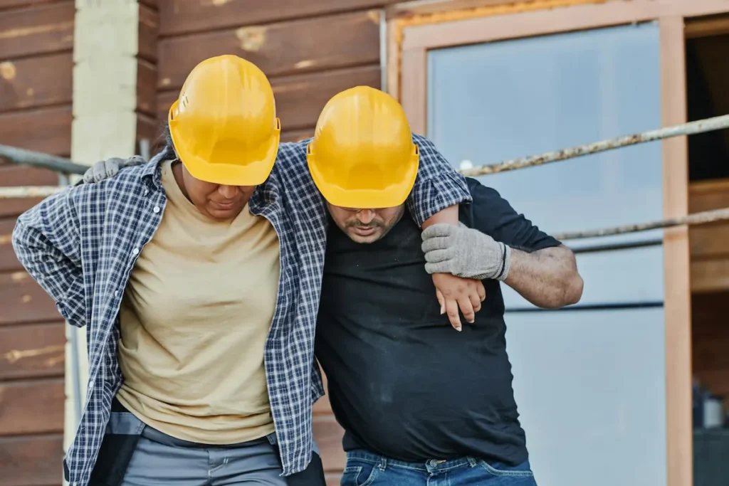 Personal injury that occurred at a job site with another worker helping them walk