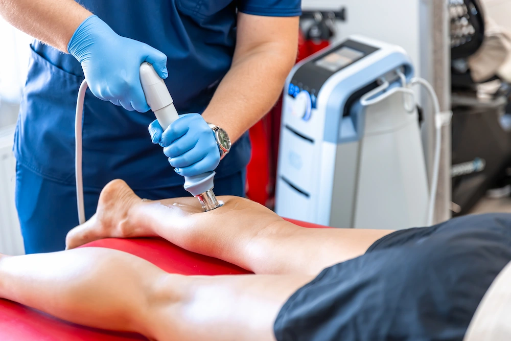 Patient receiving shockwave therapy for hip pain and bursitis