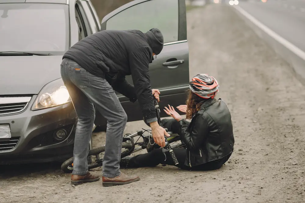 Patient receiving treatment for soft tissue injury after car accident with focused muscle therapy
